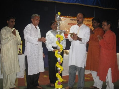 Inauguration of the program by lighting a Samai (an oil lamp)